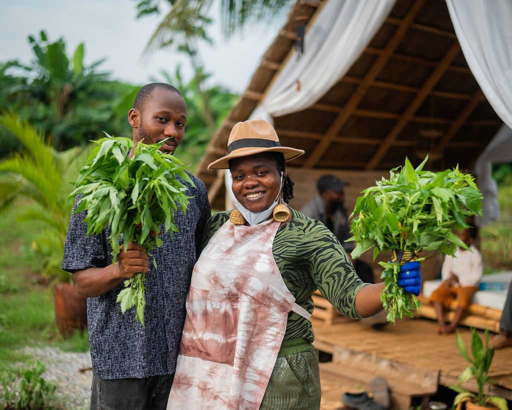 Hosts holding fresh greens